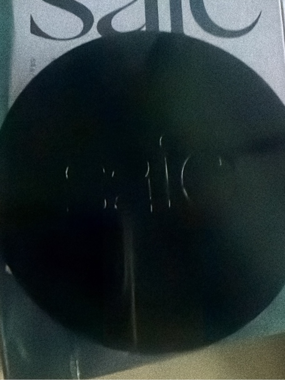 Saie Black Circular Minimalist Makeup Poster
